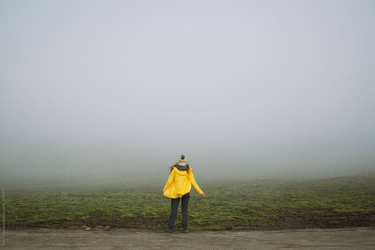 Woman in the fog in Iceland