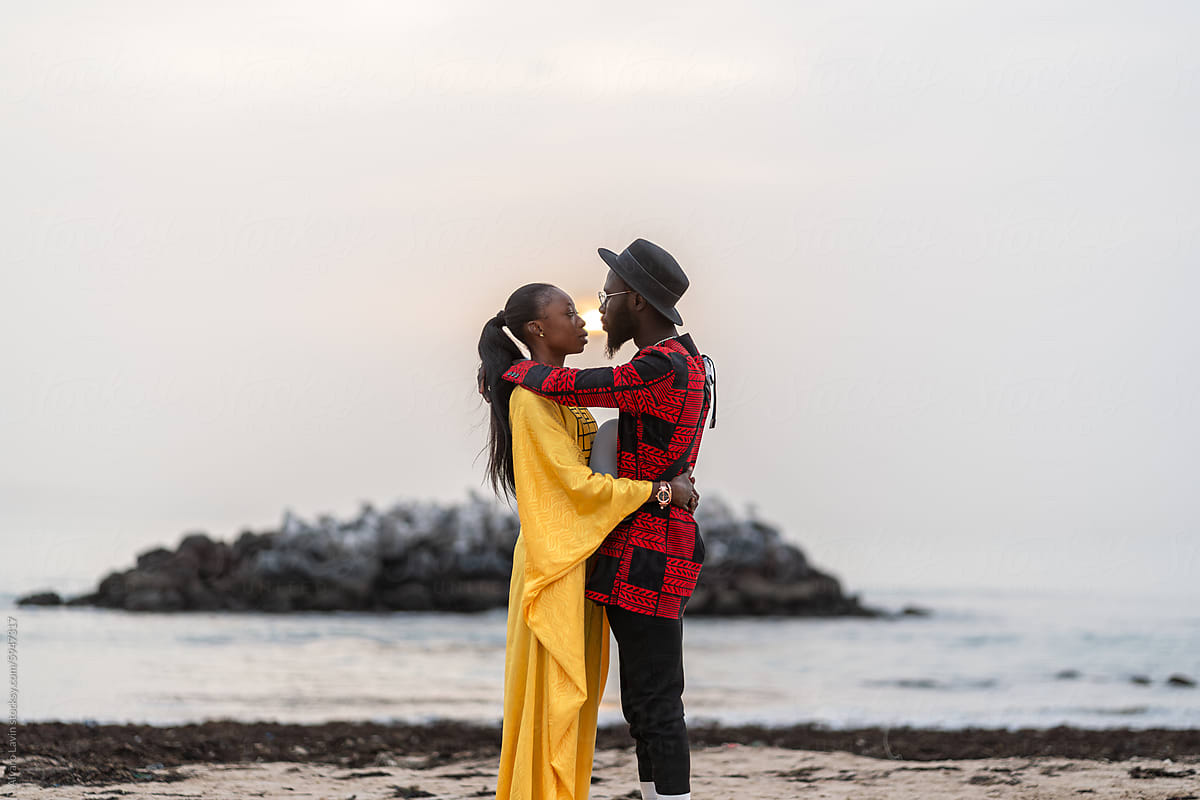 Senegalese Couple Kissing on Beach at Sunset