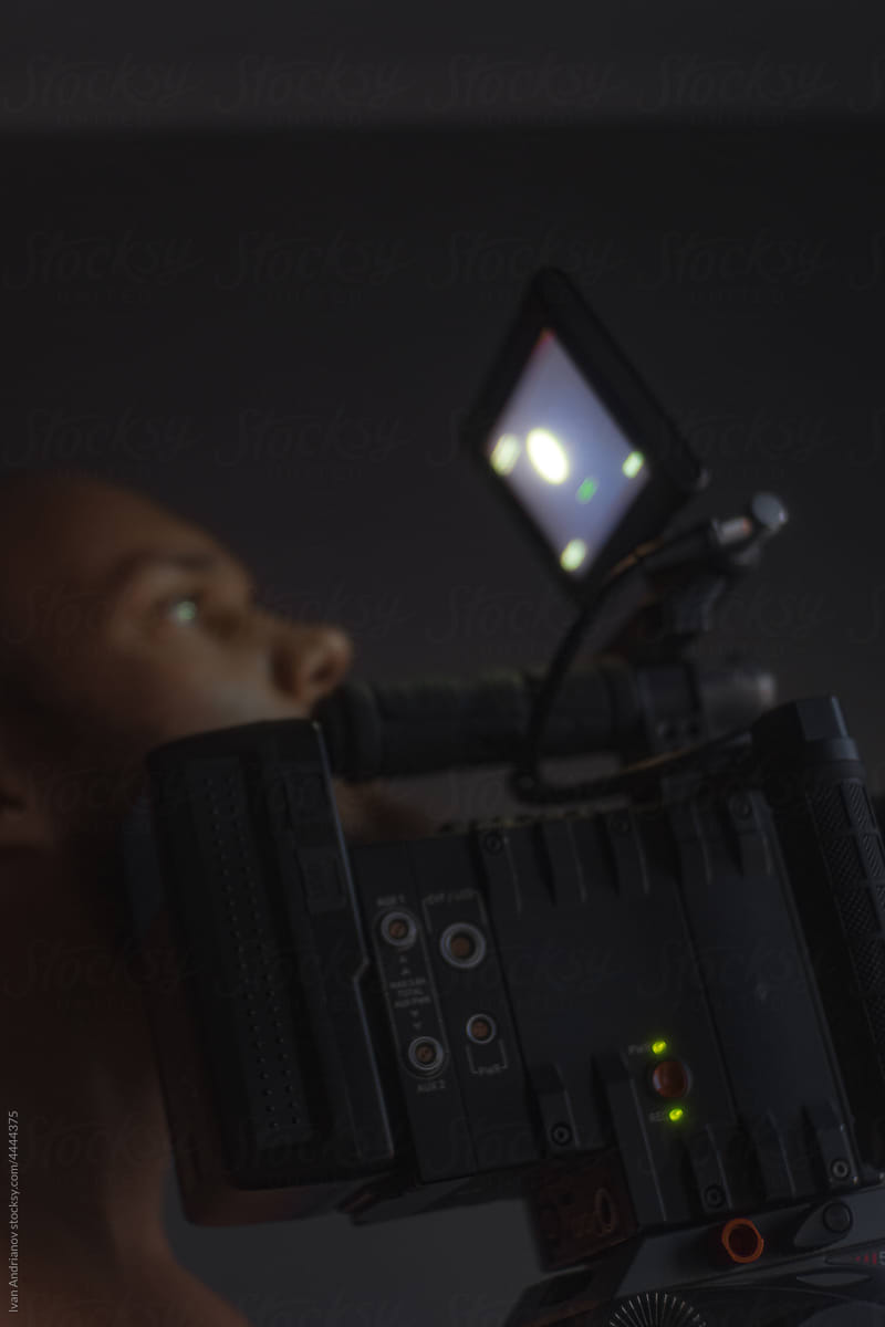 Man Filming Movie Camera