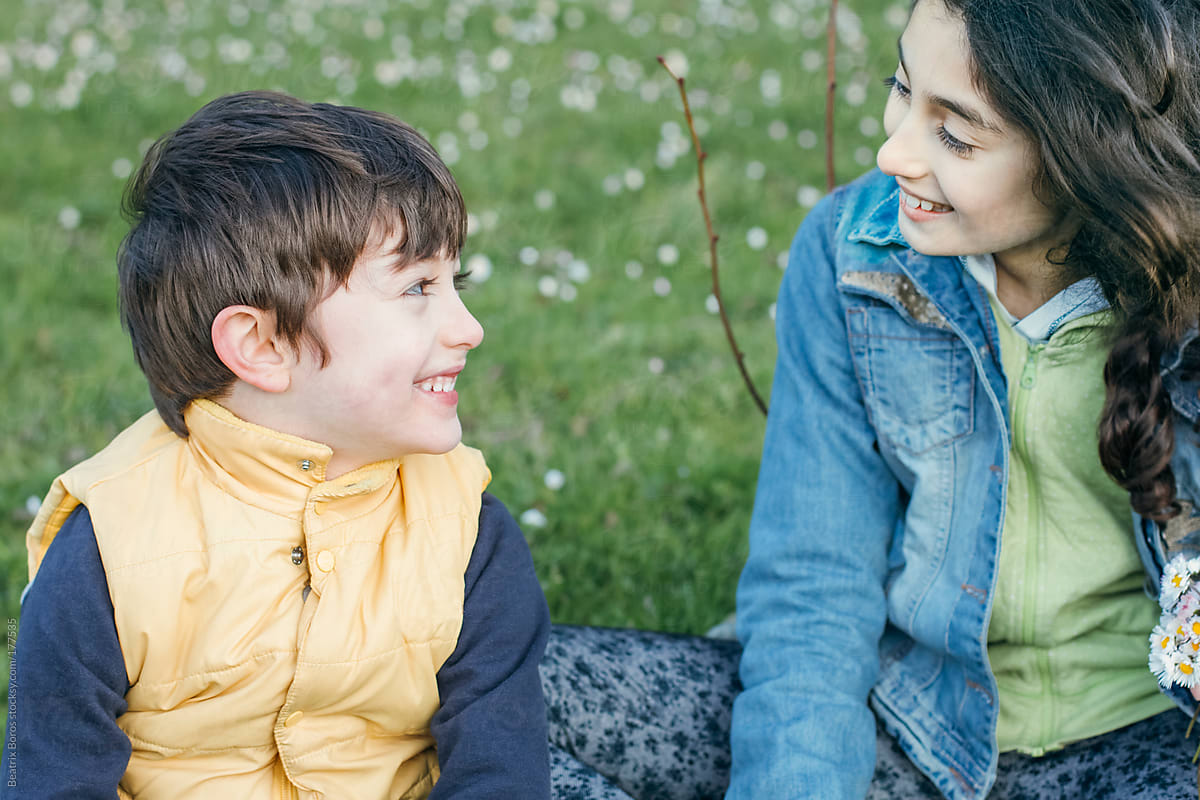 Siblings Are Having Fun Talking And Laughing With Each Other By