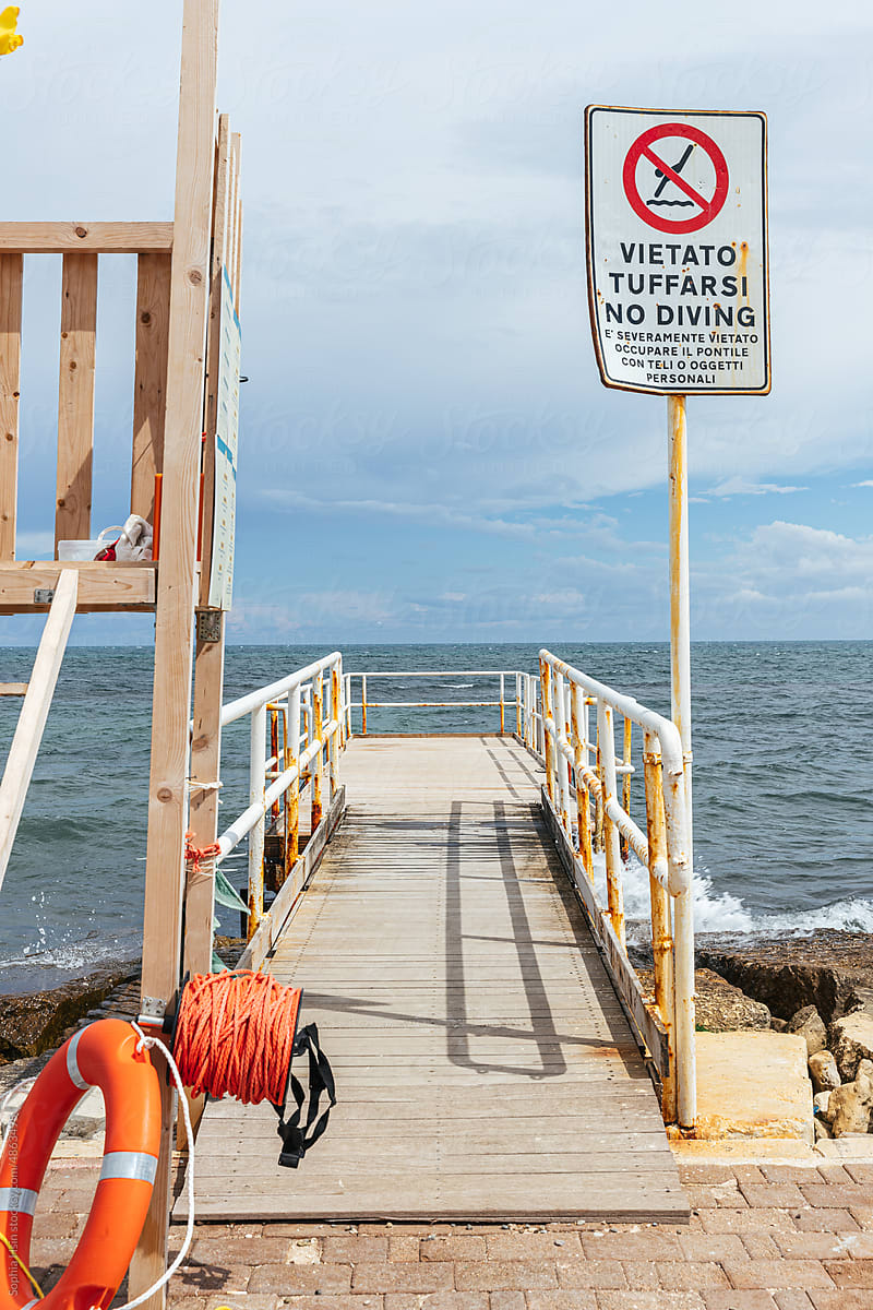 View of the dock with no swimming sign