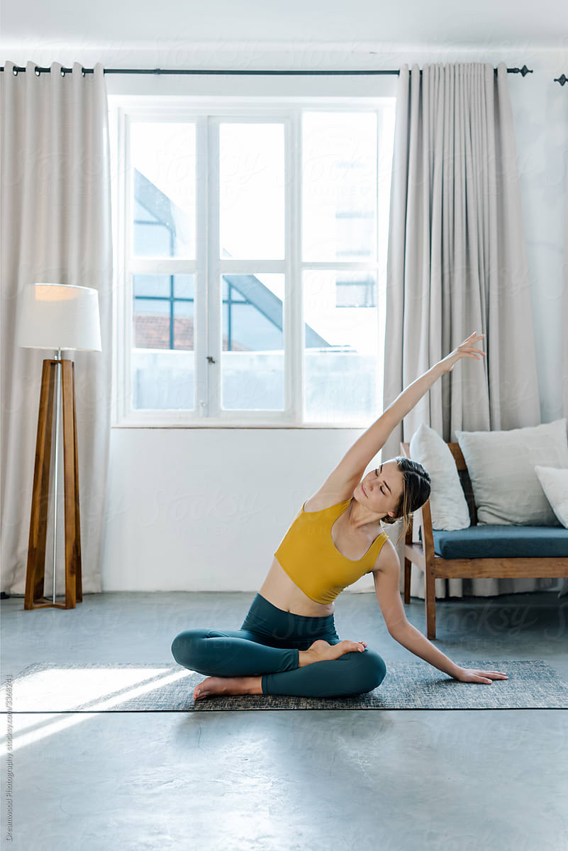 Woman stretching body in morning