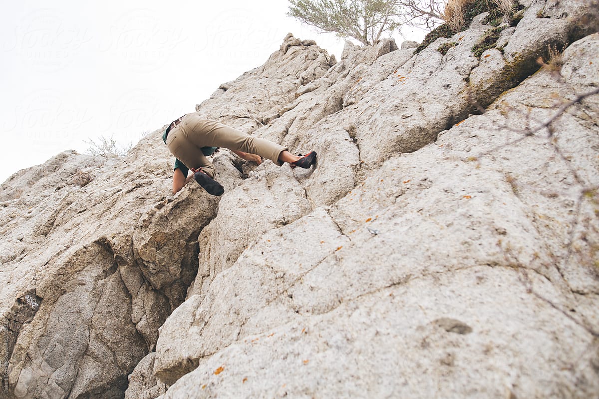 Man Rock Climbing in Utah