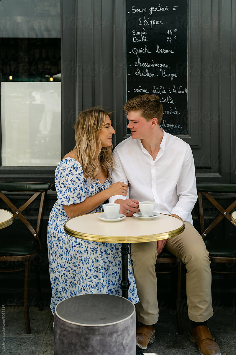 couple having coffee in Paris