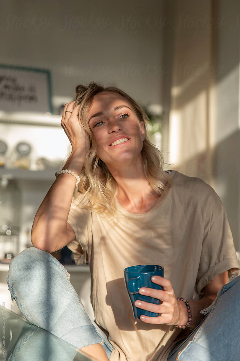 Woman happy in the morning with coffee