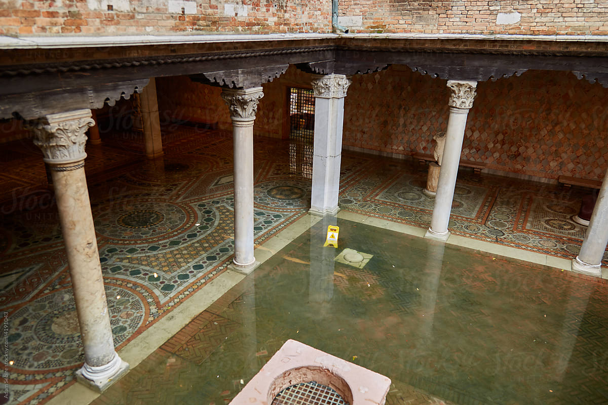 Venice antiquities, heritage tiled floor mosaic submerged