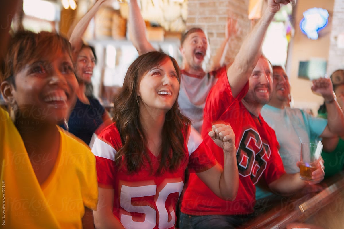 Football: Fans In Bar Cheering On Their Team