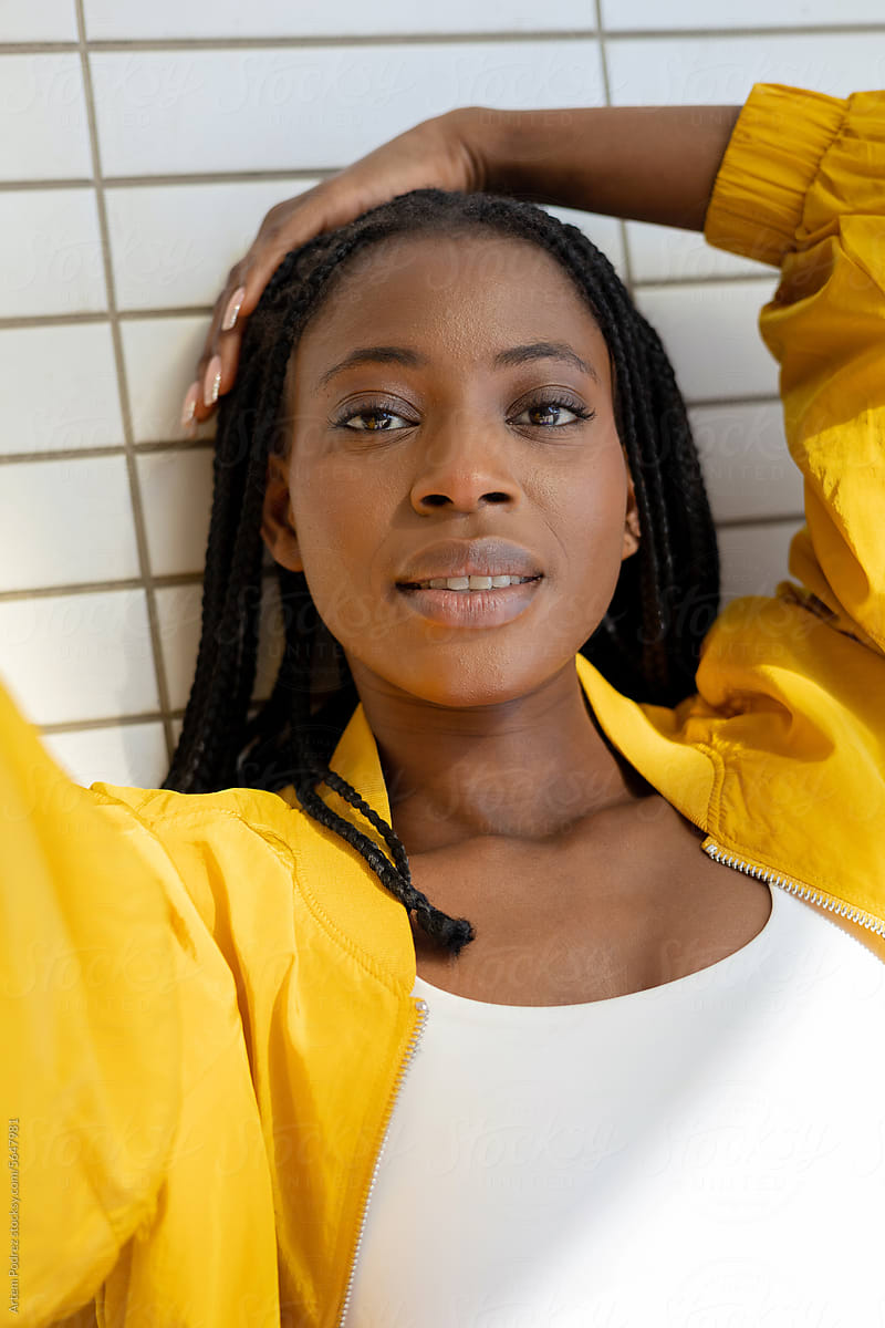 Portrait of a Woman in a yellow sports jacket