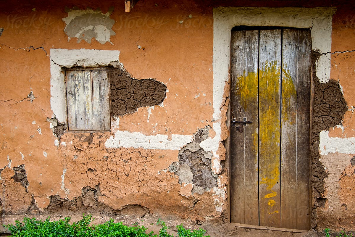 Old cracked poor house  in small village community, Uganda, Africa