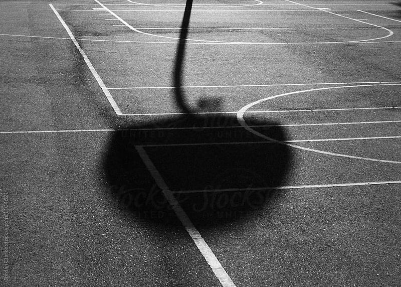 Shadow of a basketball hoop
