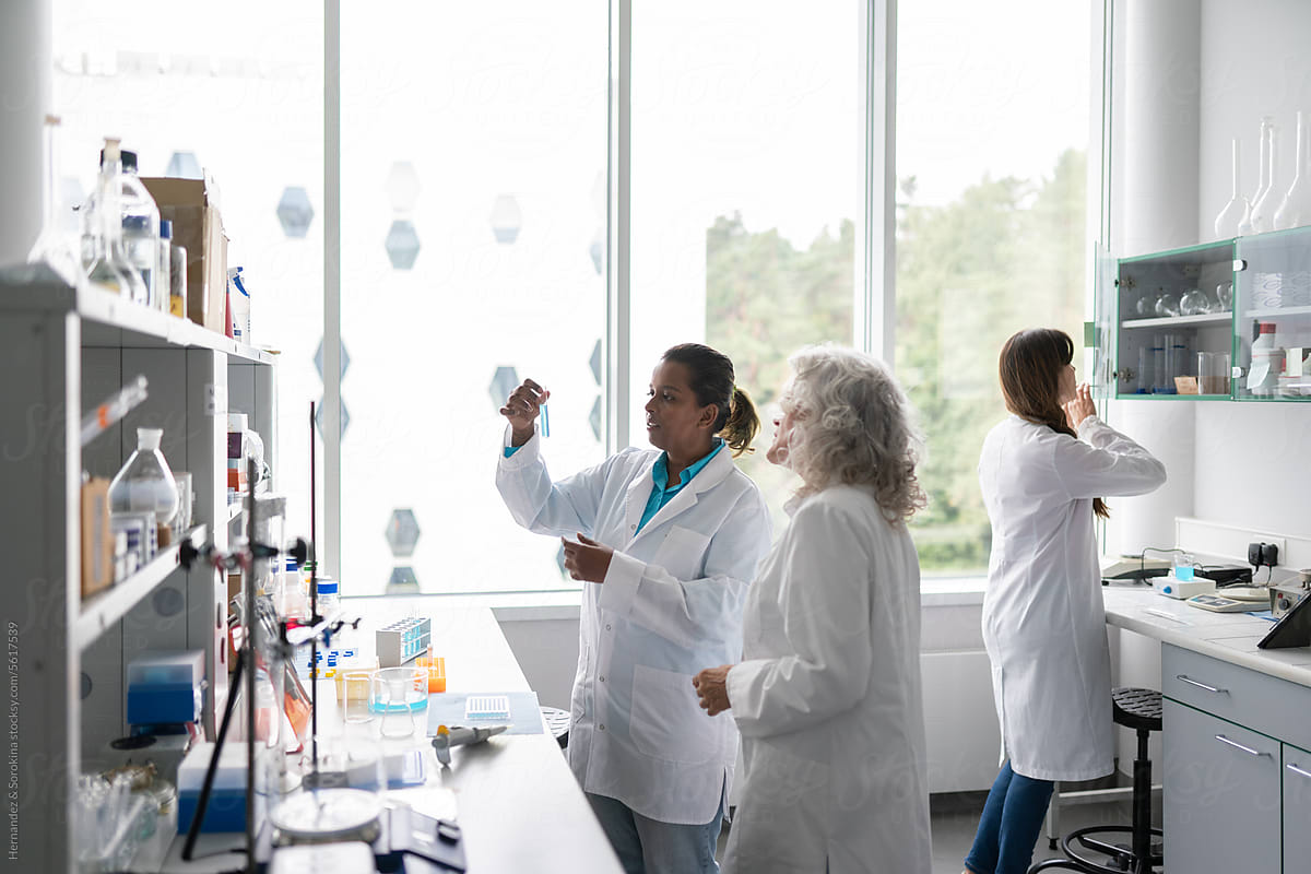 Multiracial Female Scientists Working In Lab
