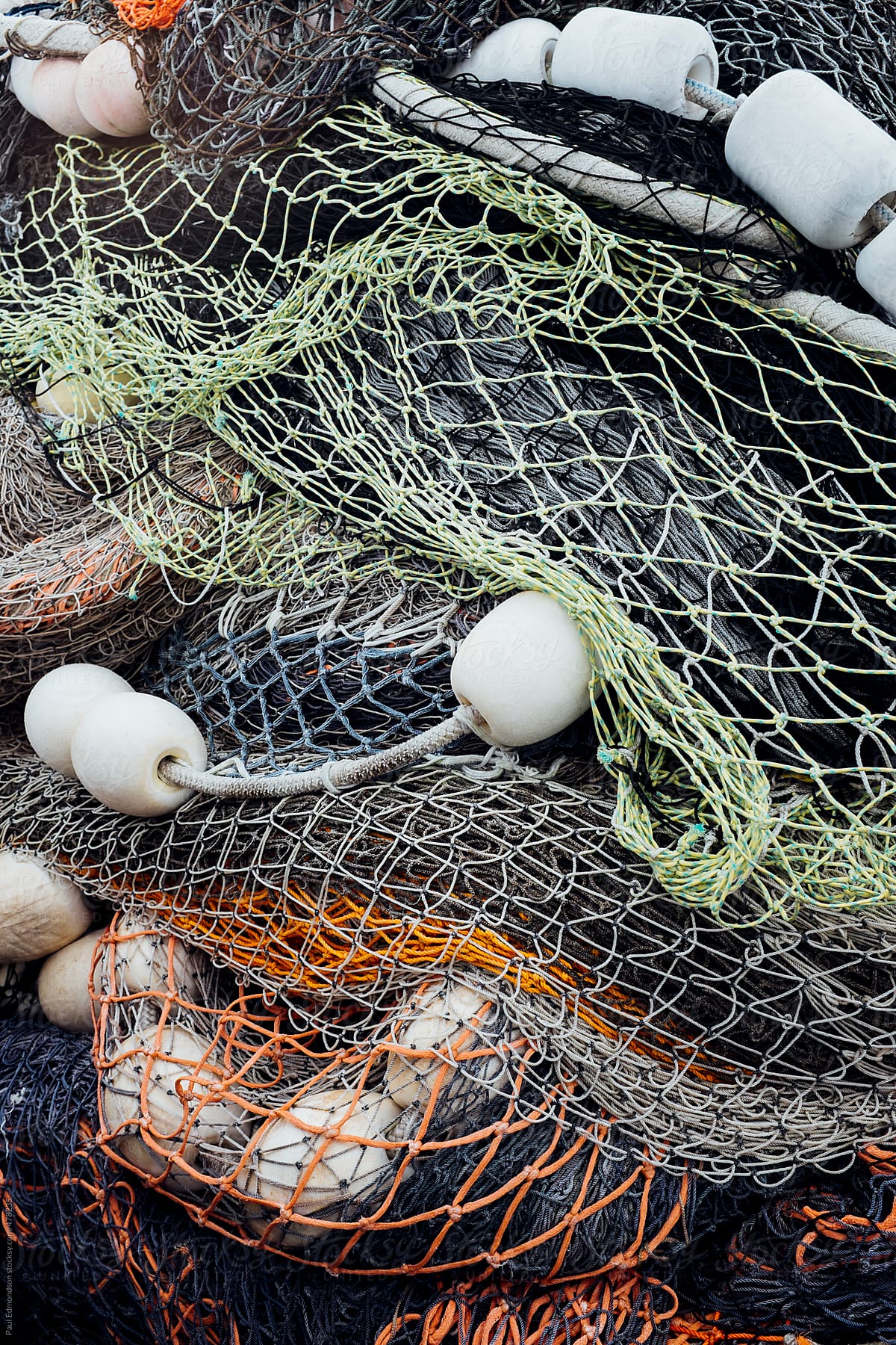 Pile Of Commercial Fishing Nets by Stocksy Contributor Rialto
