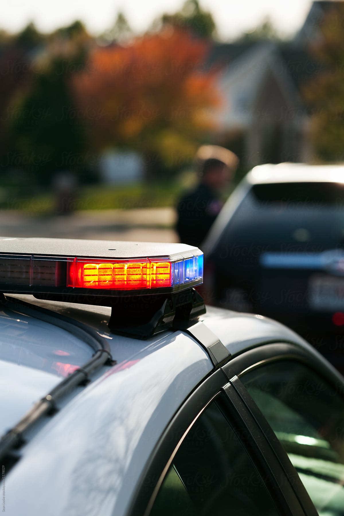 Police: Focus On Car Light Bar As Officer Talks To Driver