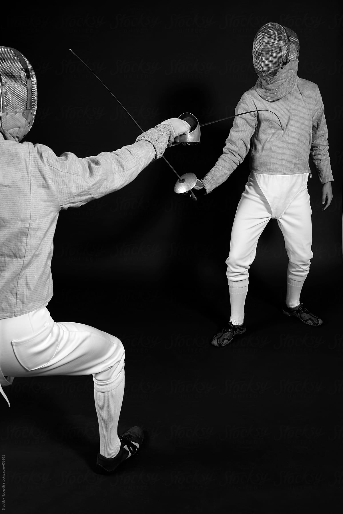 Black and white picture of a fencing battle