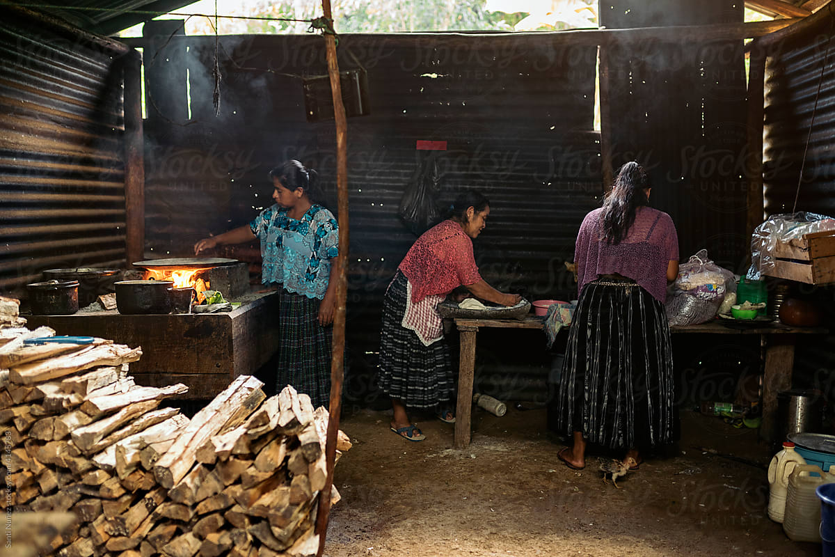 Group of guatemalan women preparing creole food