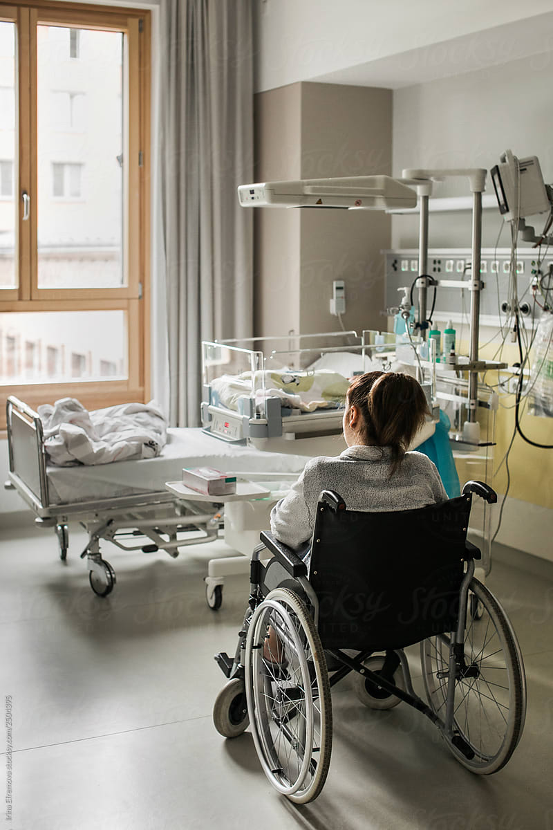 Mother sitting in a wheelchair in neonatal department
