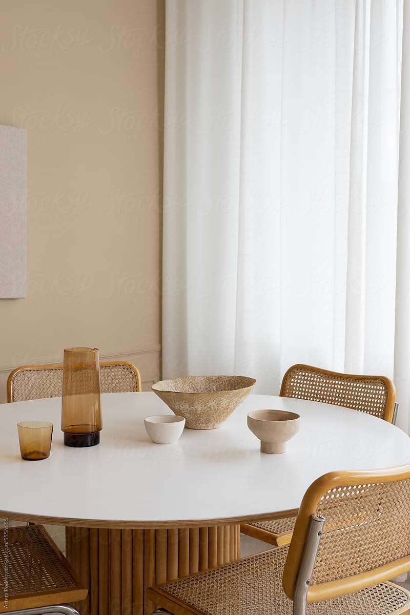 A close-up of a modern dining room with stylish furniture