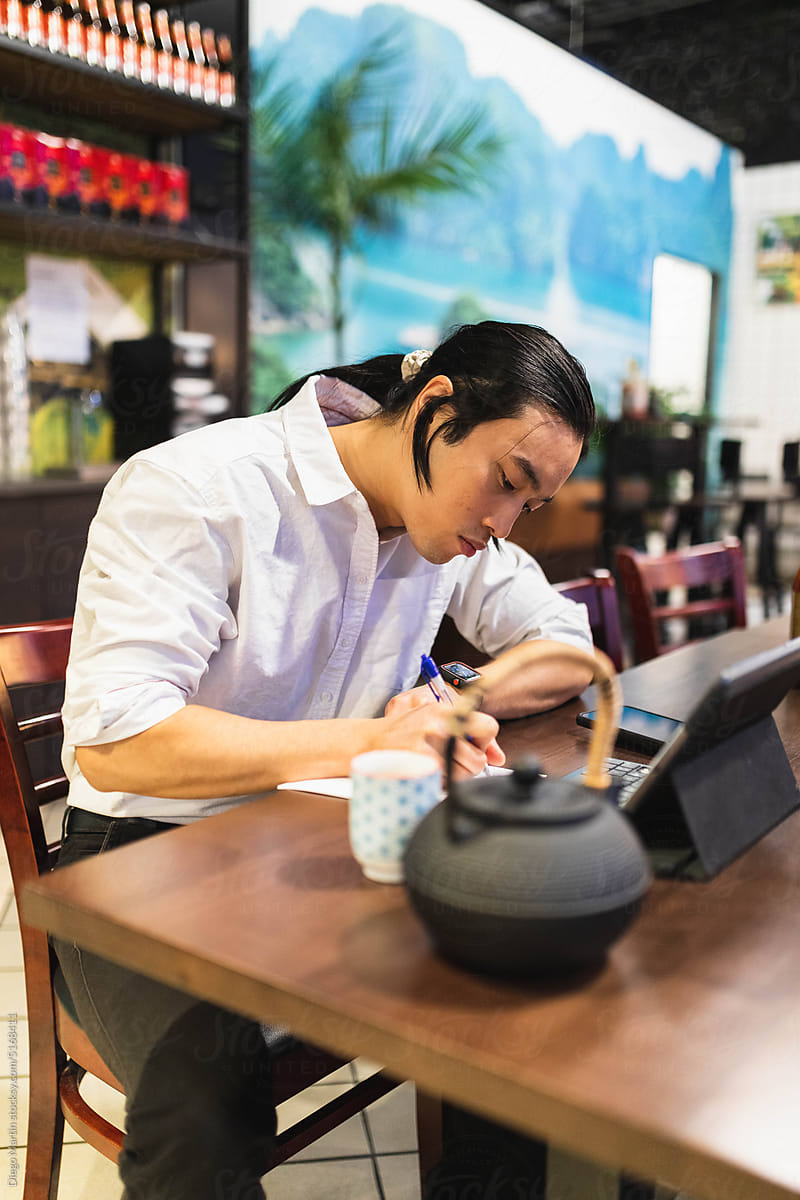 Asian man working in a restaurant