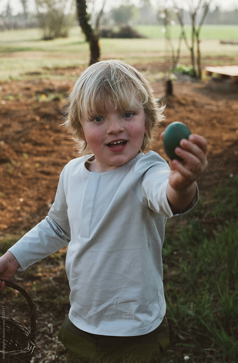 Toddler Boy smiling Easter Egg Hunt