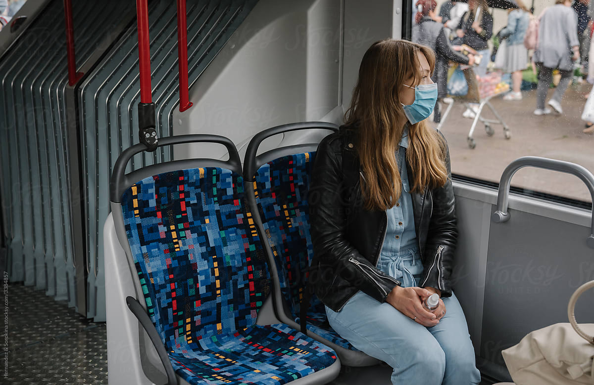 Woman In Public Transport Wearing Surgical Mask