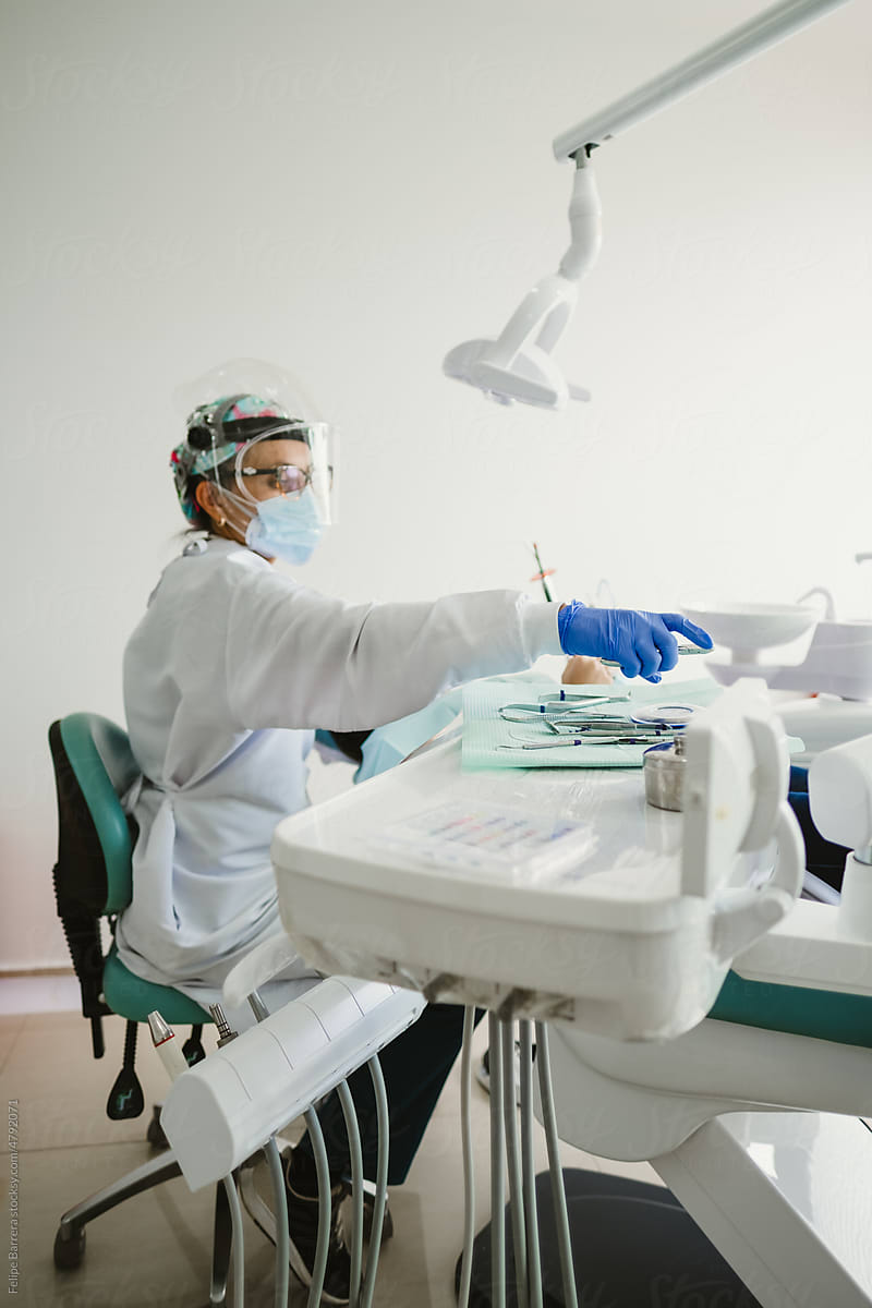 Dentists during a dental intervention with a patient