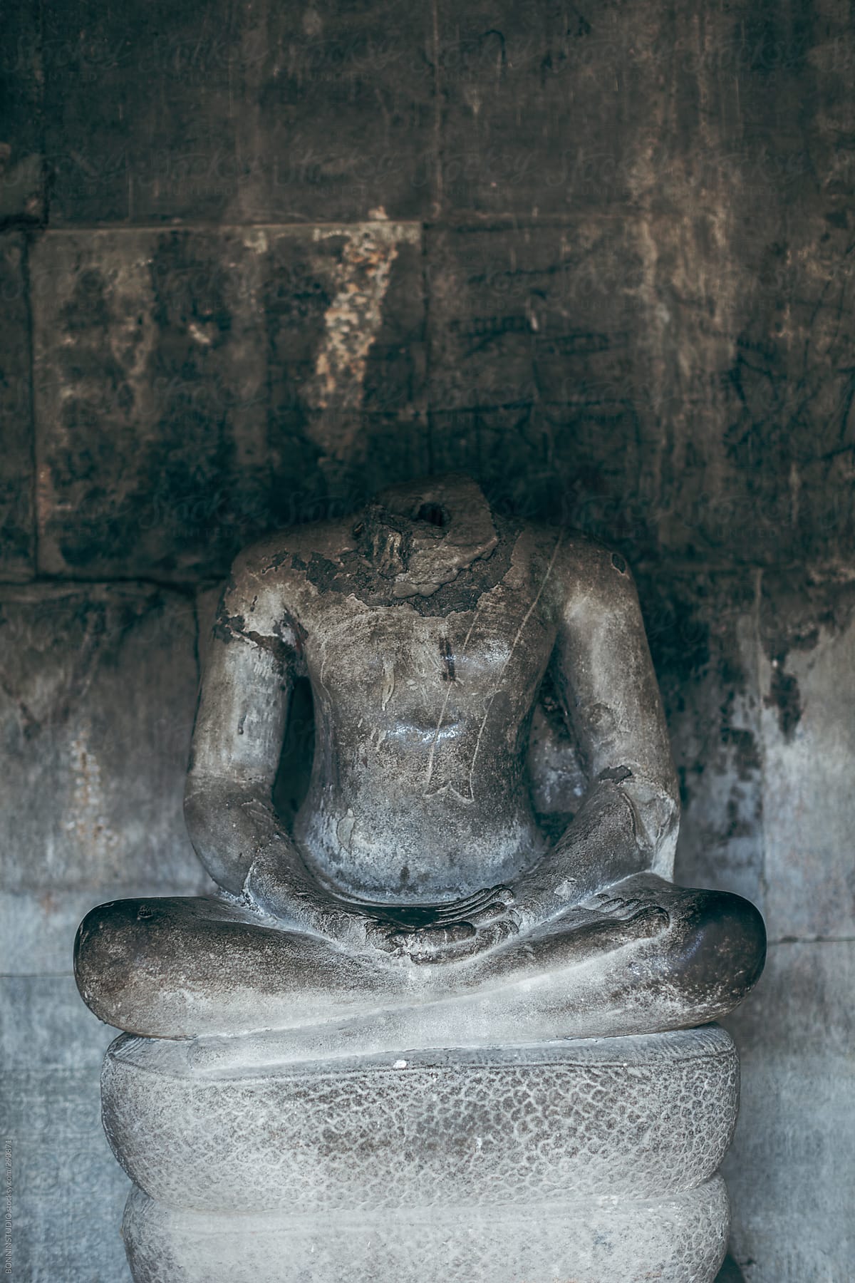 Buddha sculpture. Details of Angkor Wat temple.