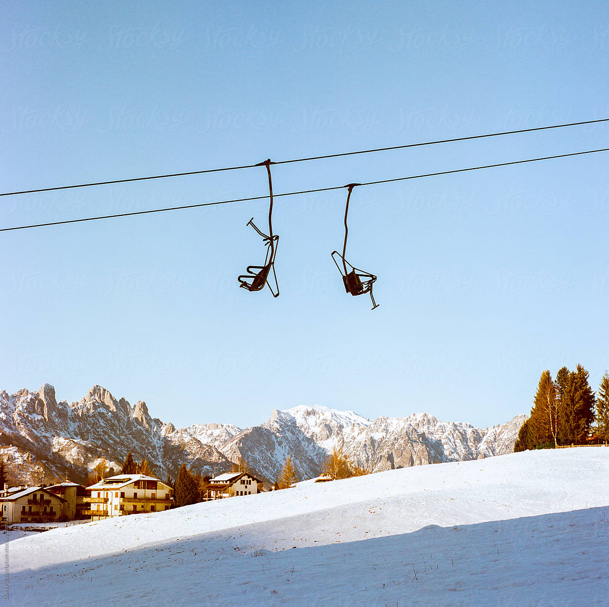 Mountain landscape with hotels and a ski lift