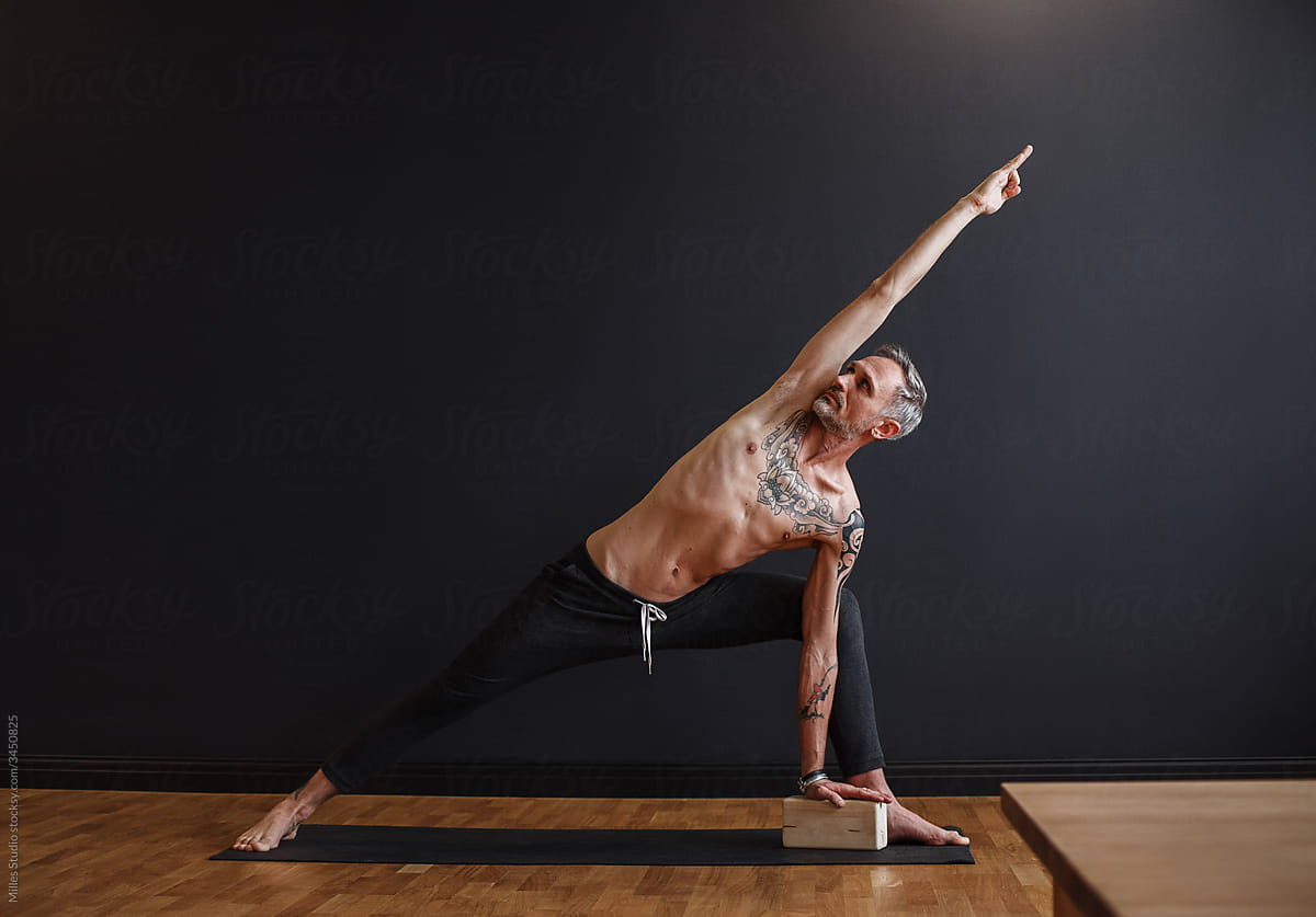 Premium Photo | Man in yoga pose with namaste gesture isolated on black