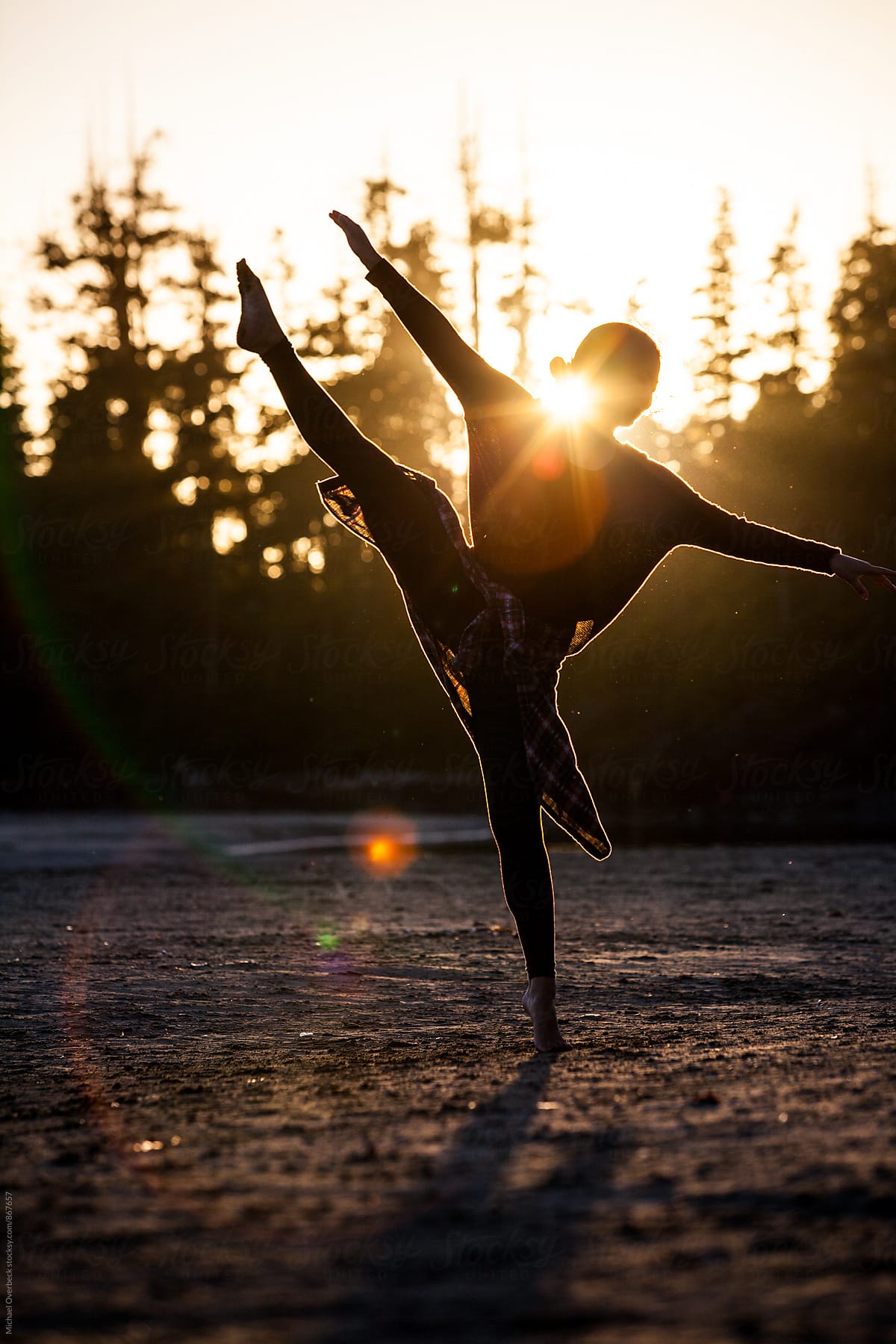 Dancing At Sunset by Stocksy Contributor Michael Overbeck