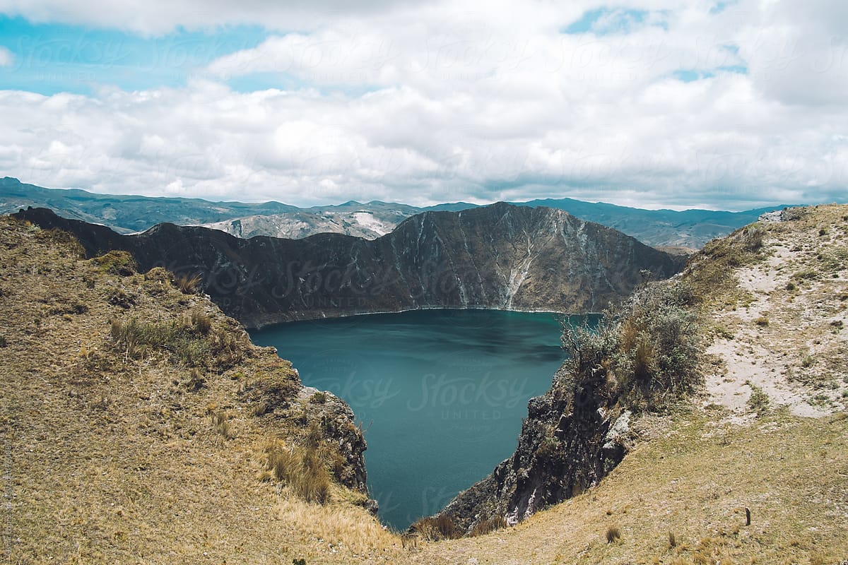The Crater Lake Peaking through the Ridges of a Volcano