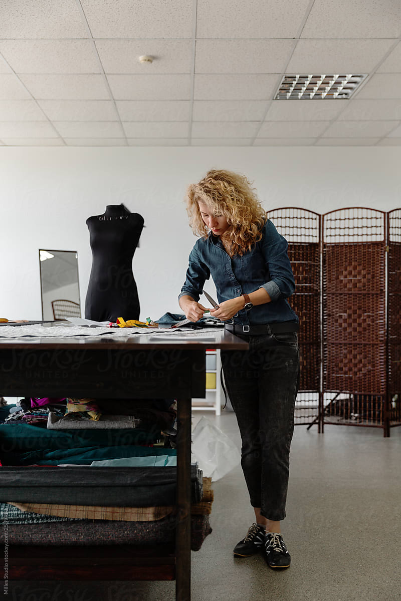 Woman working in studio creating clothes