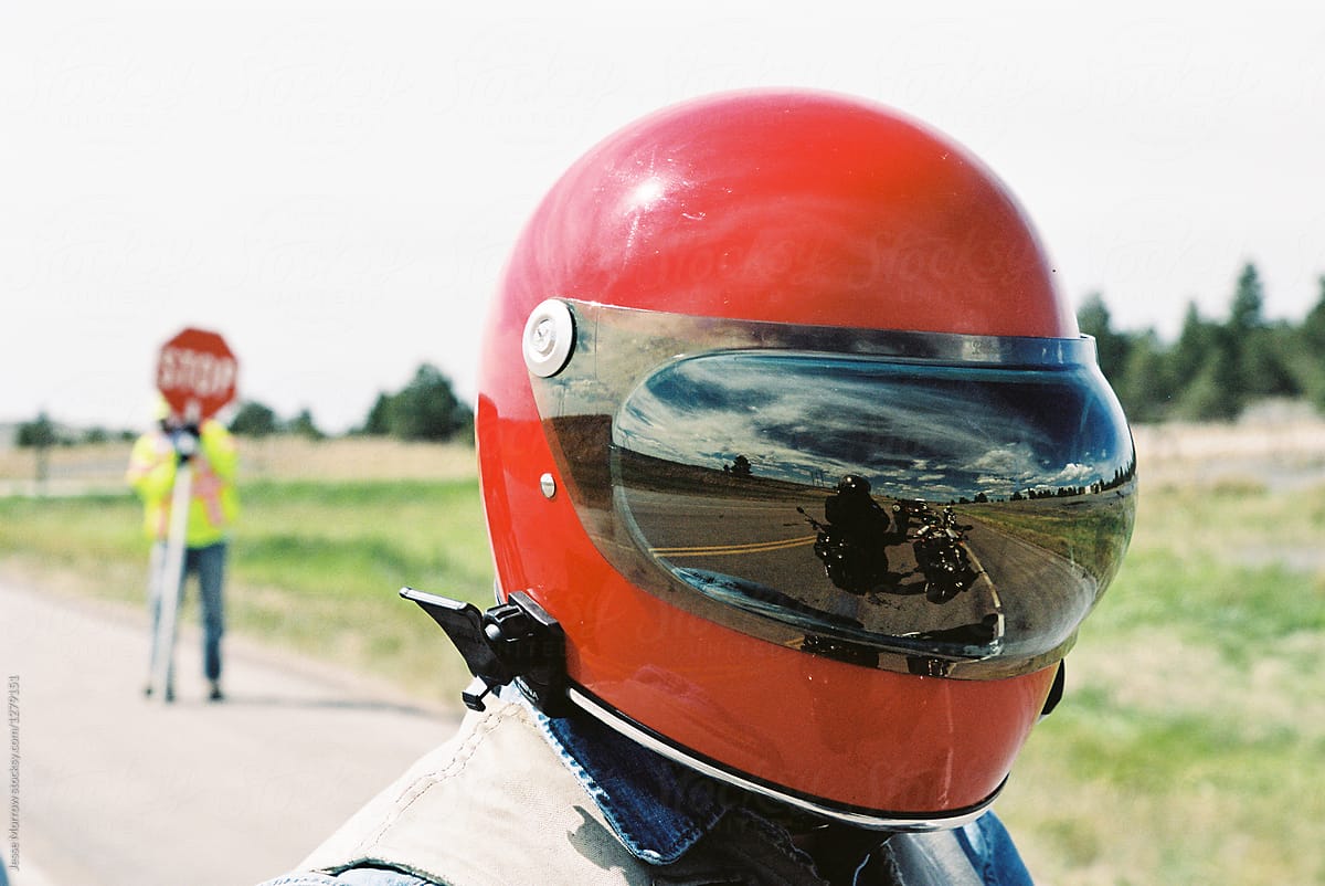 adult wearing motorcycle helmet