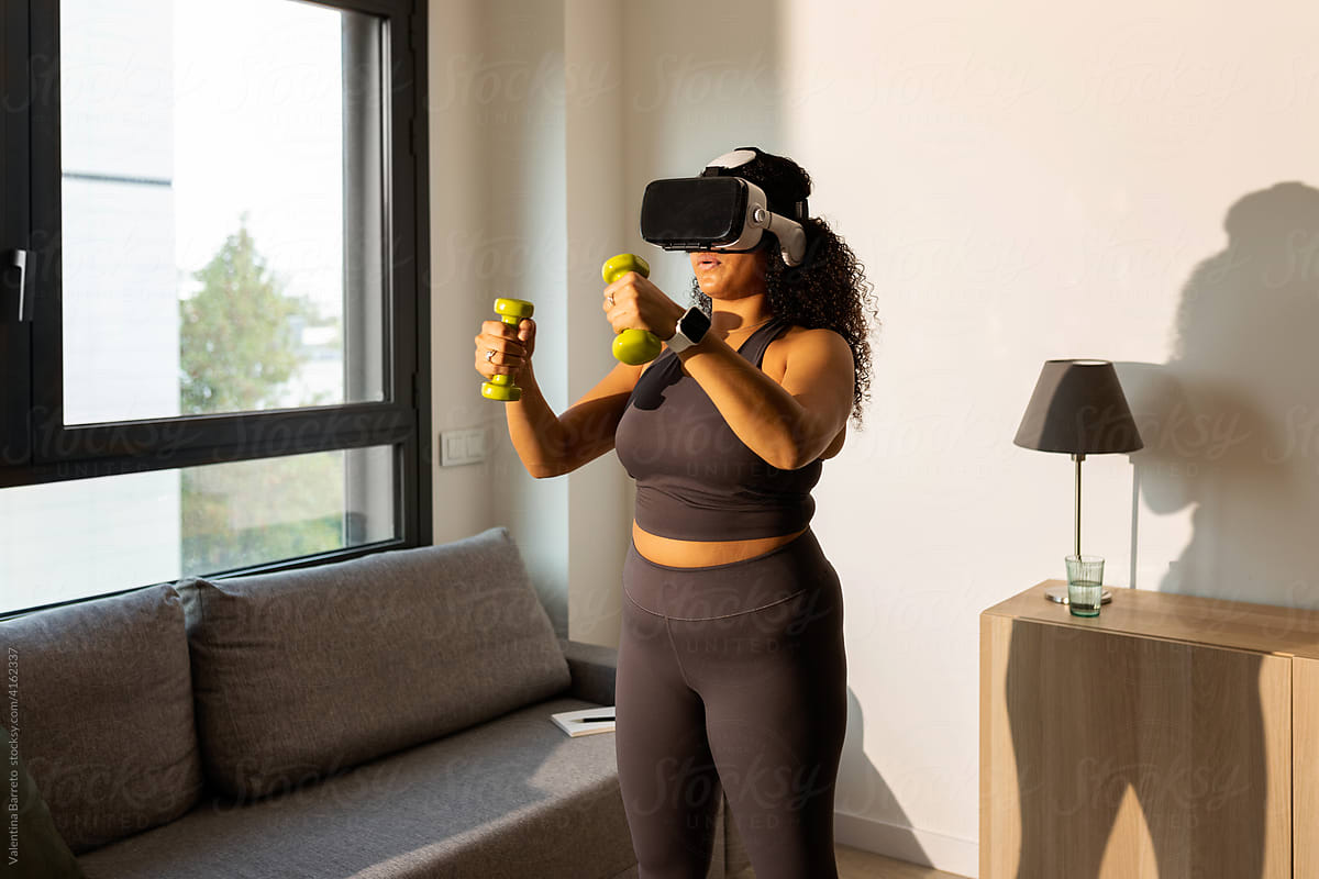 Woman training with virtual reality glasses