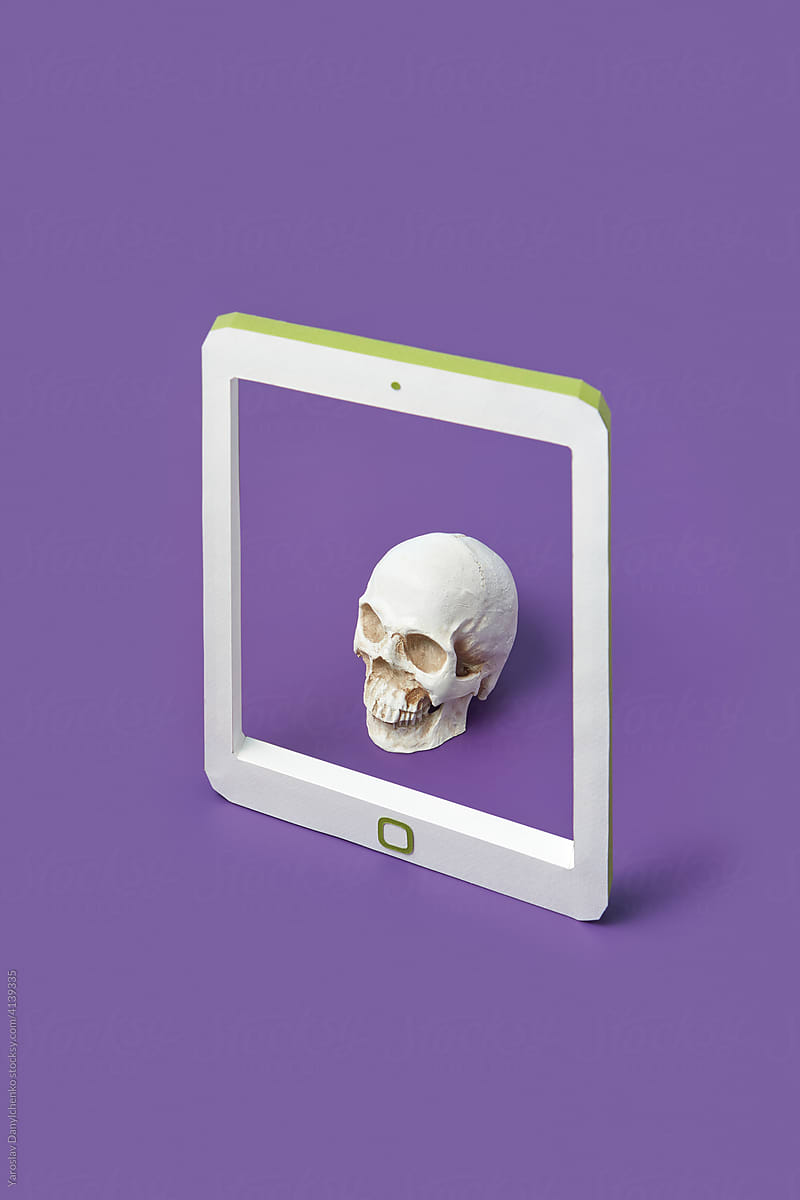 Small skull in smartphone frame