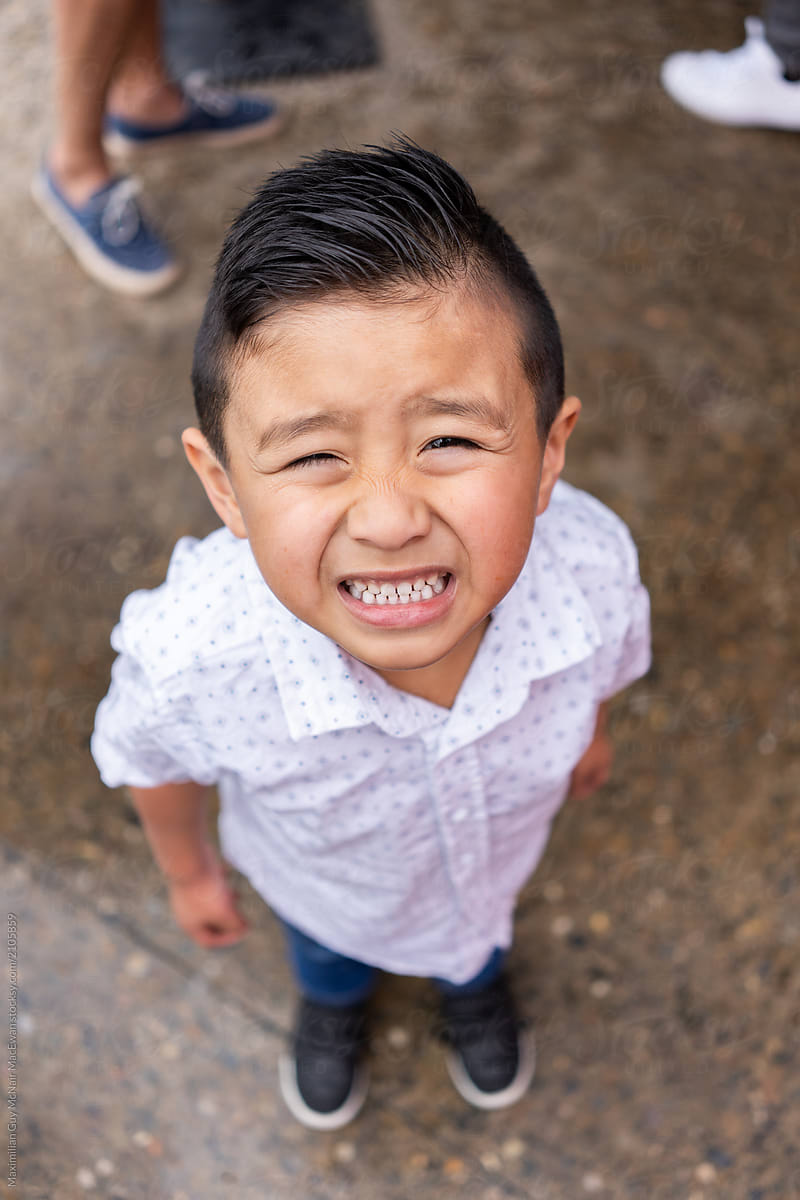 Young Asian Kid Pulling Funny Faces