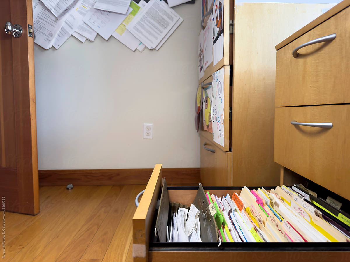 Tax Receipts  in file folder in file cabinet  in home office