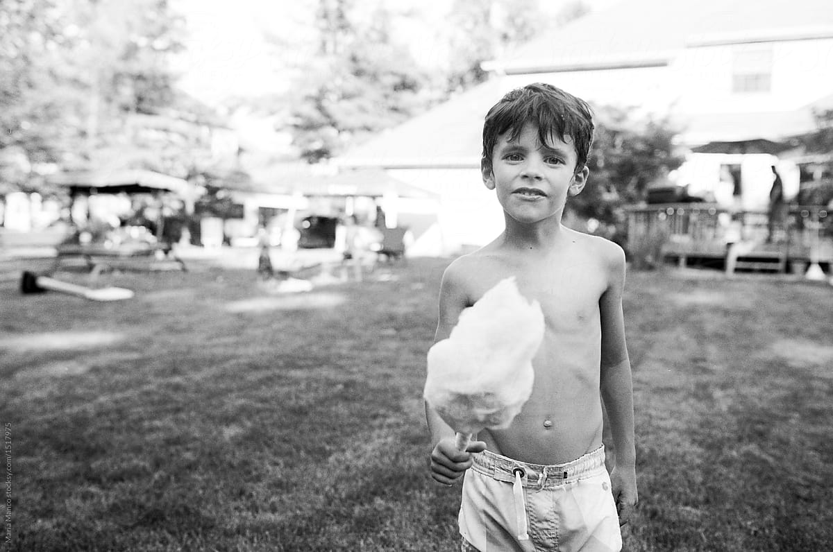 boy eating cotton candy