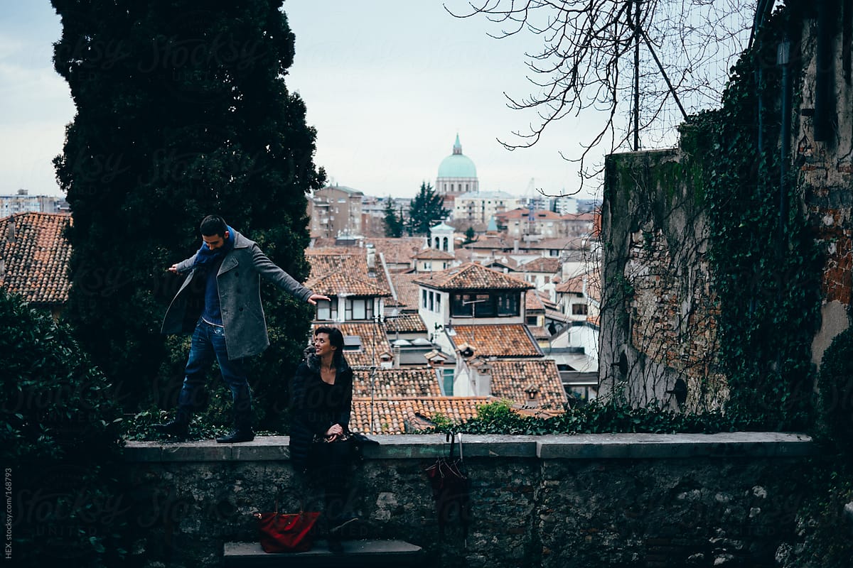 Young Couple Visit Italian City. Balance