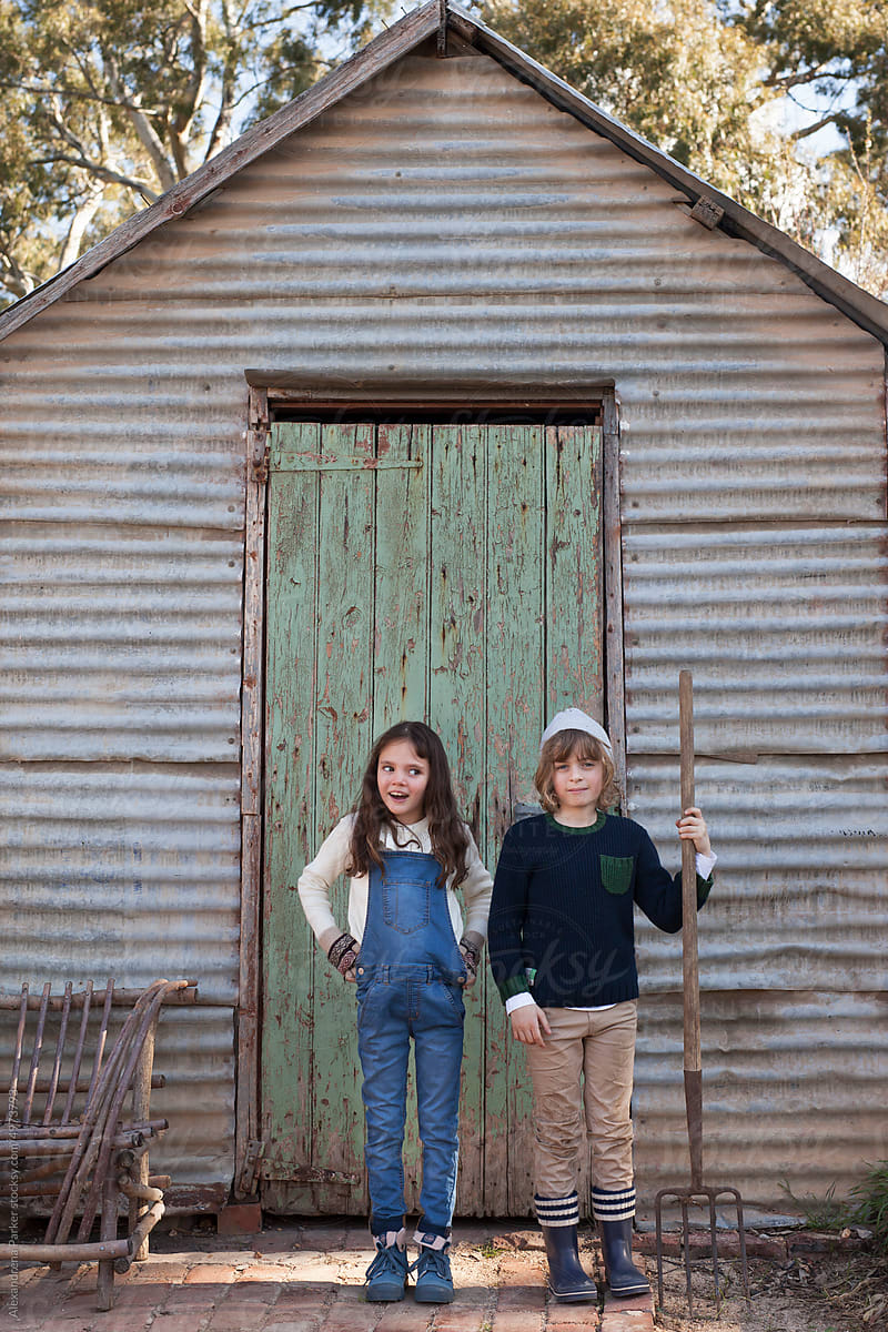 Kids in front of old shed