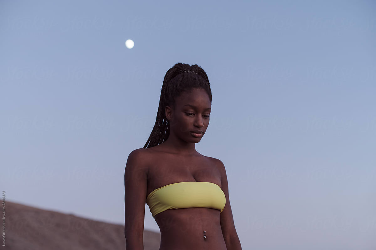 African woman and the moon
