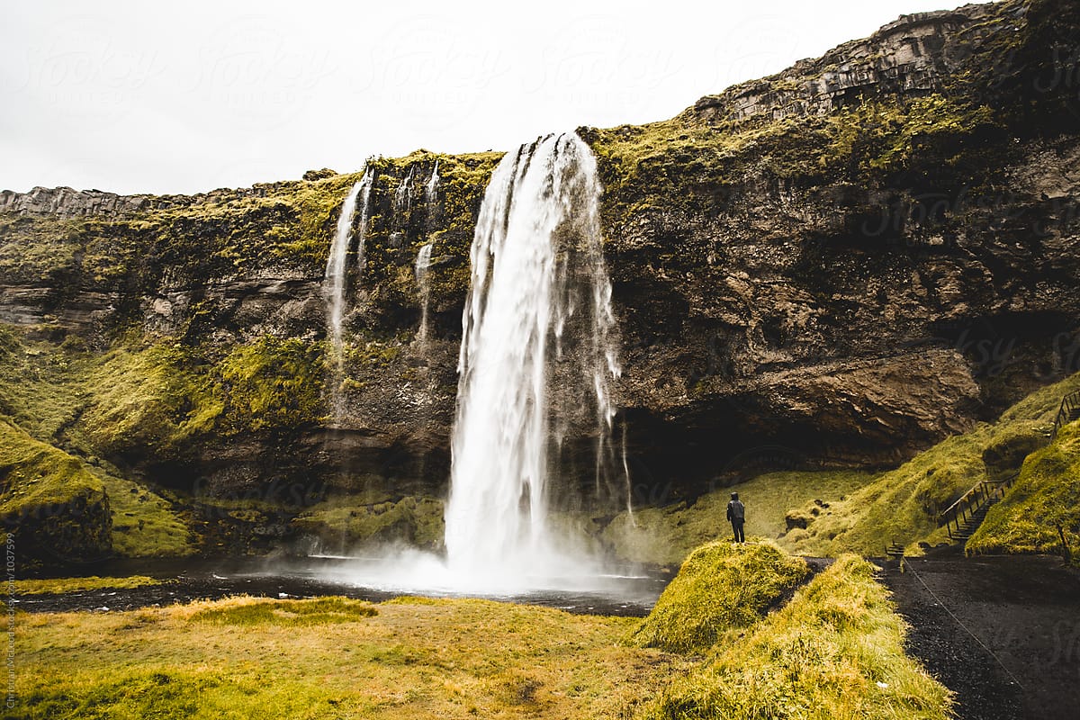 Icelandic waterfall pouring violently from torrential rain.