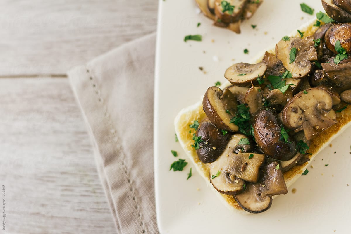 Garlic mushroom bruschetta on plate horizontal