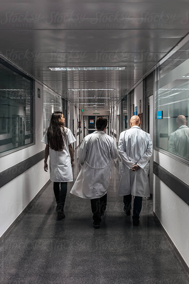 Back view of walking through A hospital corridor in a profession