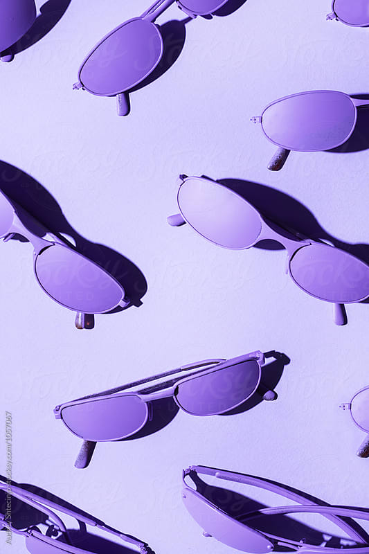 Purple/ violet sunglasses on purple/violet background