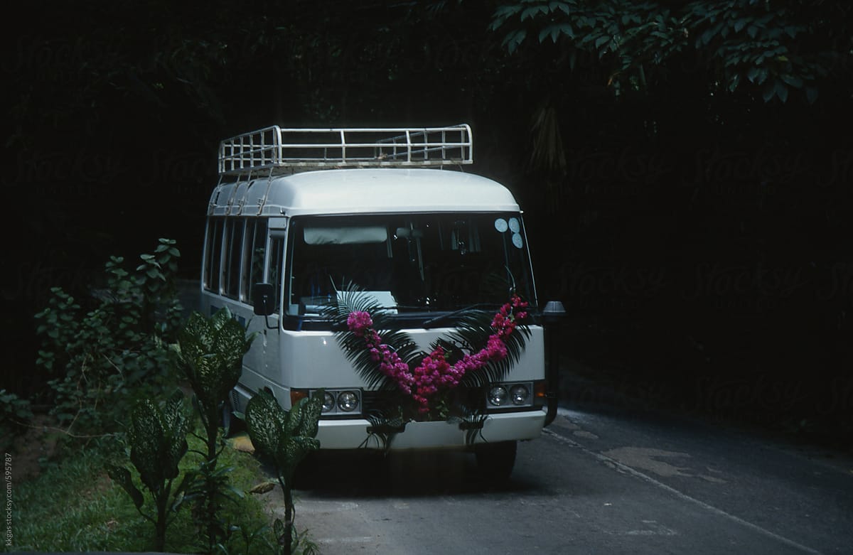 Old van with pink flowers.