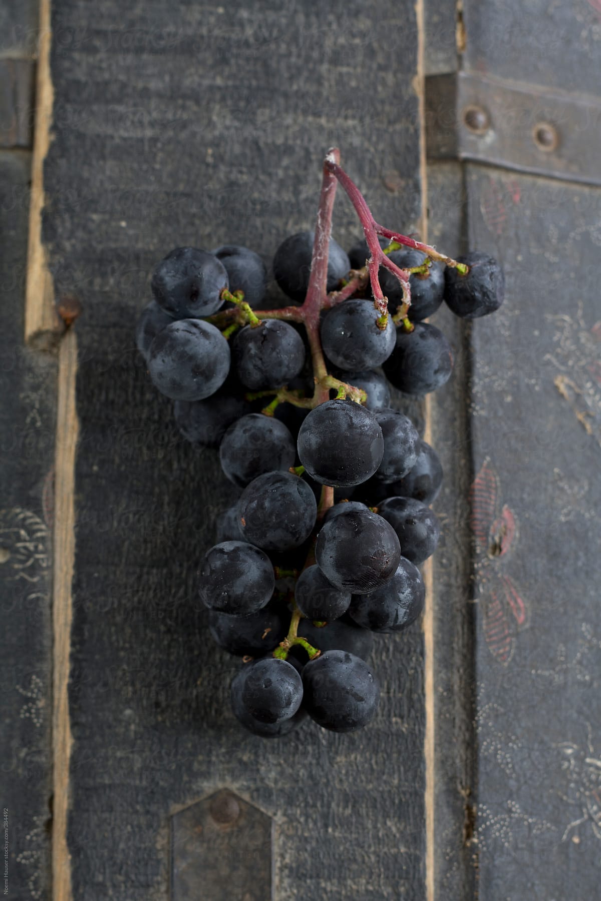Grape on dark wood background