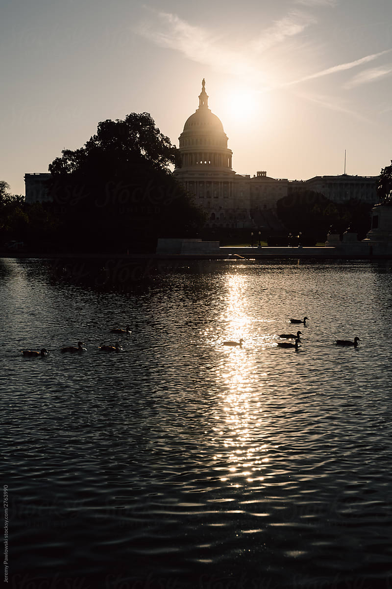 Sun Rising Behind United States Capitol