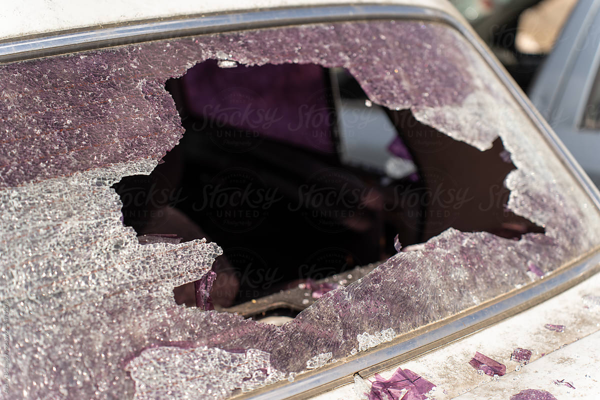 Bullet shattered rear window of a car