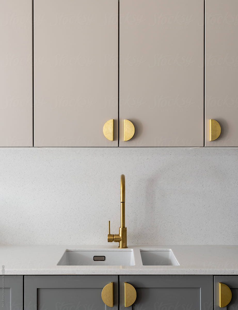 Kitchen sink and gold handles