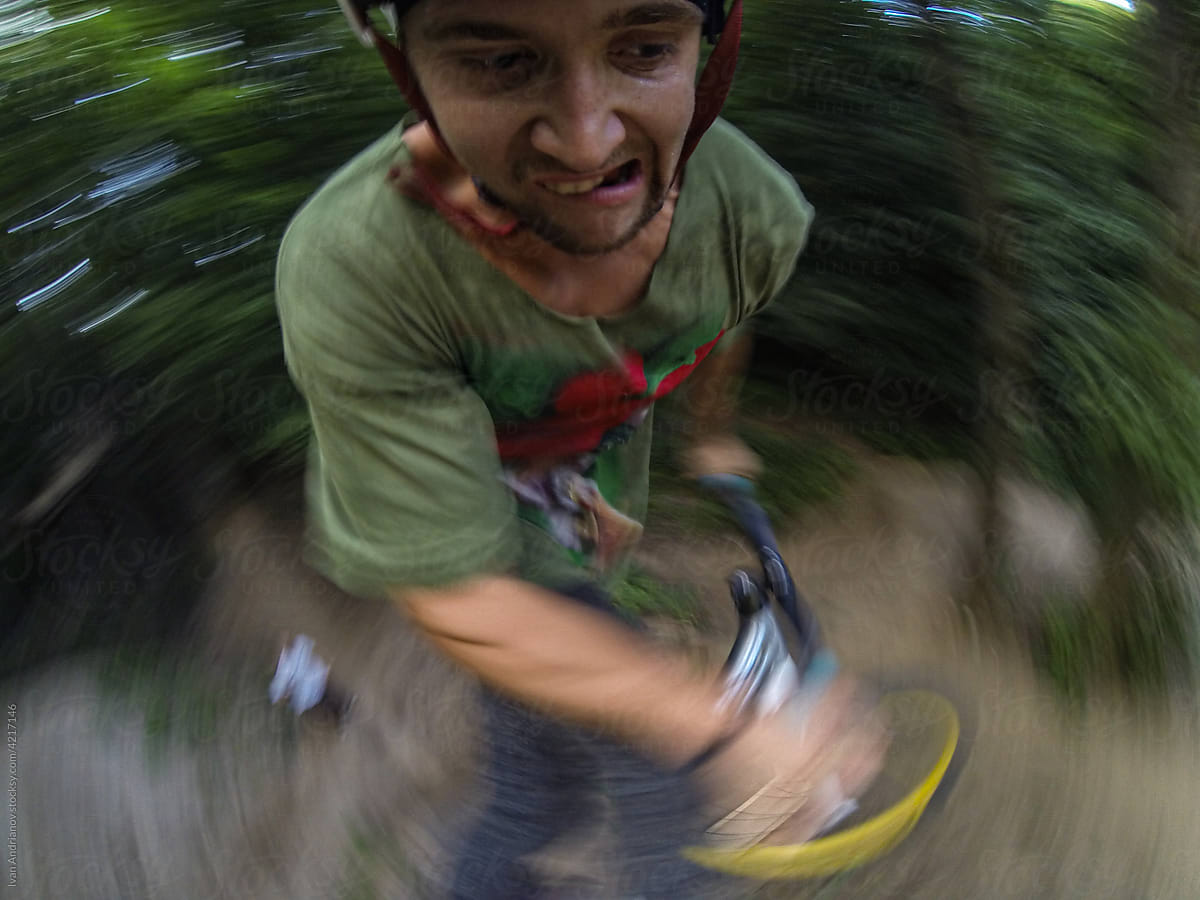 Funny Stressed Guy In Flight On A Bicycle